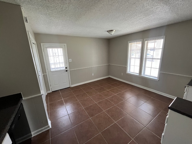 Photo - 3BR/2BA Memphis Rental with Bright Open Living Room & Fenced Yard