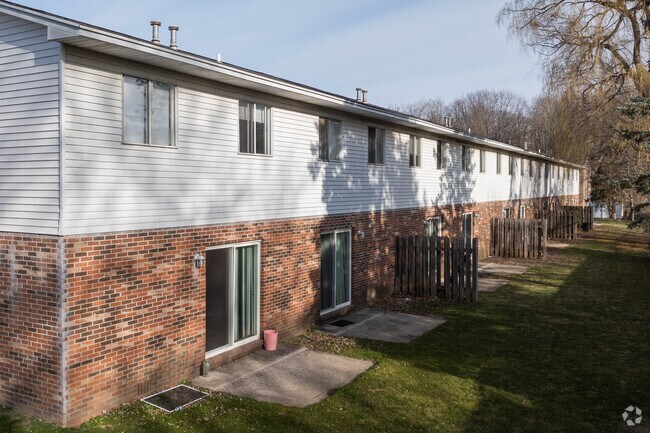 Tenant Patios in Rear of Building - Colony East Apartments