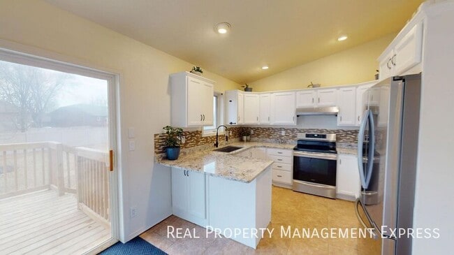 Photo - Stunning 4-Bedroom 2-Bathroom Home with Fully Fenced Yard