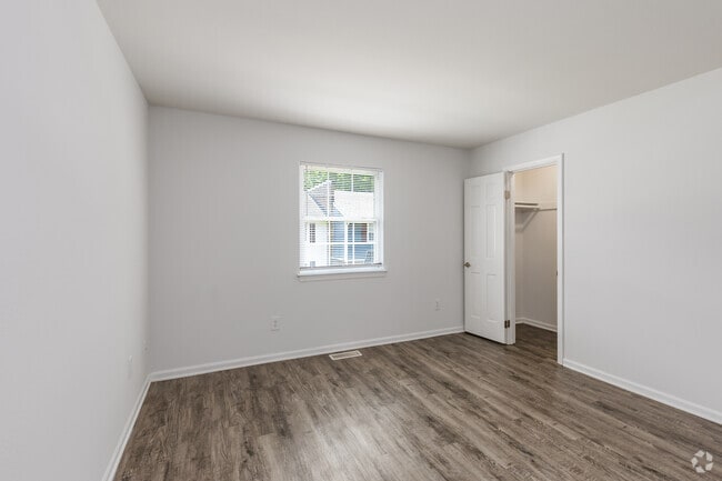 2BR, 1.5BA - 1,080SF - Primary Bedroom - Fox Hill Village