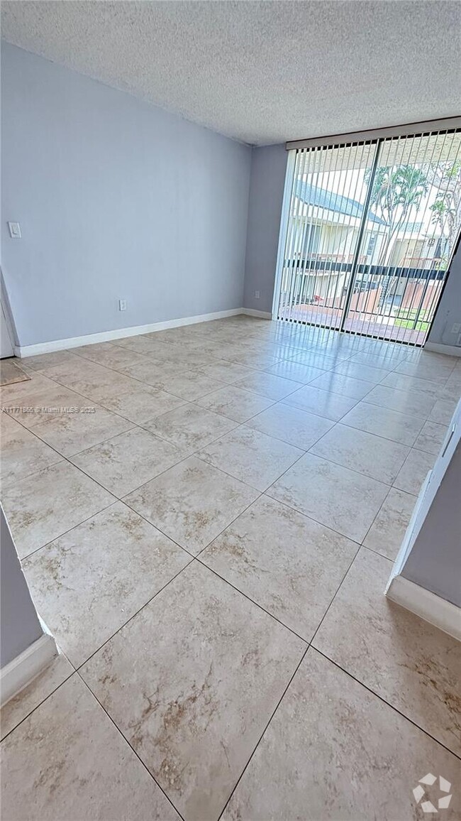 Building Photo - 8303 SW 142nd Ave Unit D202 Rental