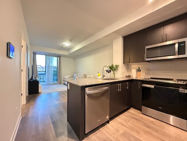 Photo - 215-335 Wheat Boom Dr Oakville Ontario L6H 7Y1 Unit 215