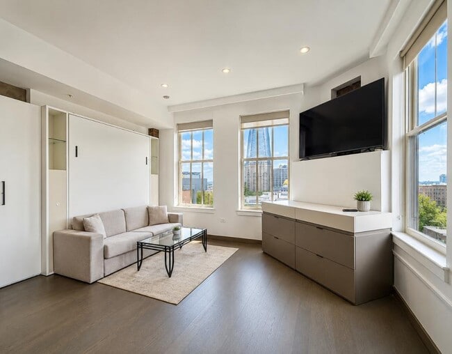 Building Photo - Gorgeous Views From Furnished Studio in Luxury Building