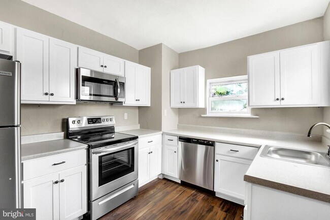 Photo - 3 Bedroom Home with High Ceilings & Natural Light!