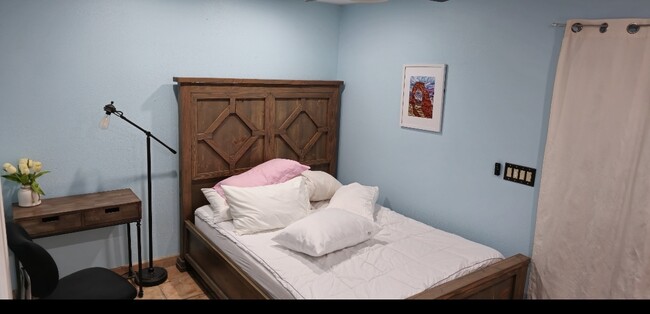 Comfy cabin bedroom with local art - 3565 N Manor Rd House Unit Private  Private Yard Utilities Included