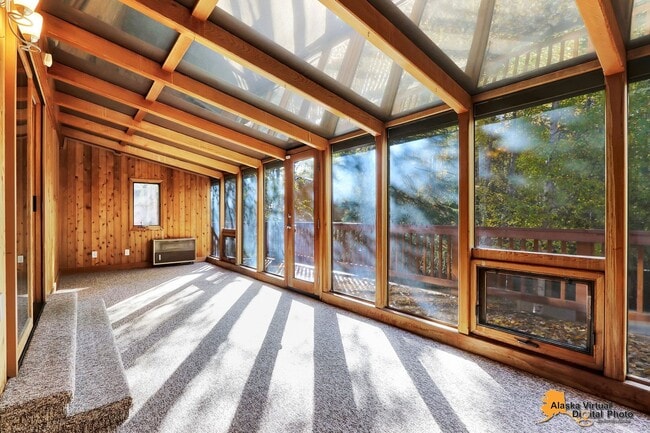 Photo - Eagle River Home w/ Fenced Yard, Sunroom, and Garage!