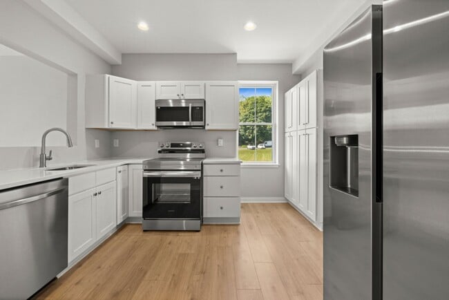 Photo - 2 Bedroom with porch. Completely remodeled! Unit 3W