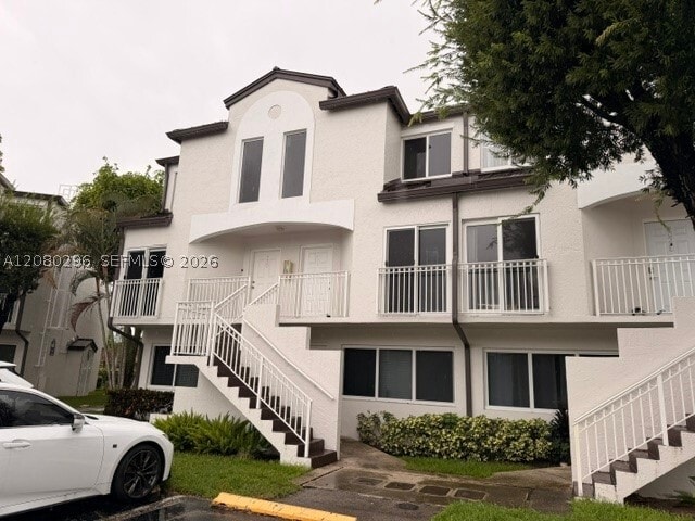 Building Photo - 8670 NW 6th Ln Unit 4-201