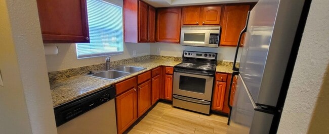Photo - VERY NICE & AFFORDABLE 2 BED / 2 BATH CONDO – W/D, PATIO, POOL!