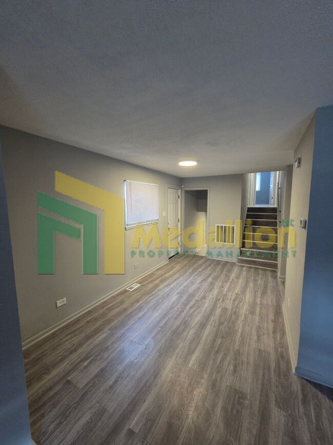 Photo - Updated 5-Bedroom Home with Finished Basement and Fenced Yard