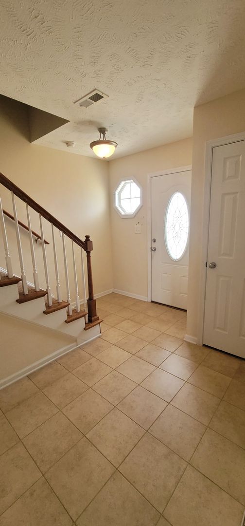 Photo - Beautiful 3 bedroom, 2.5 Bath home Minutes from Shopping & Easy Access to Highway for Travel.