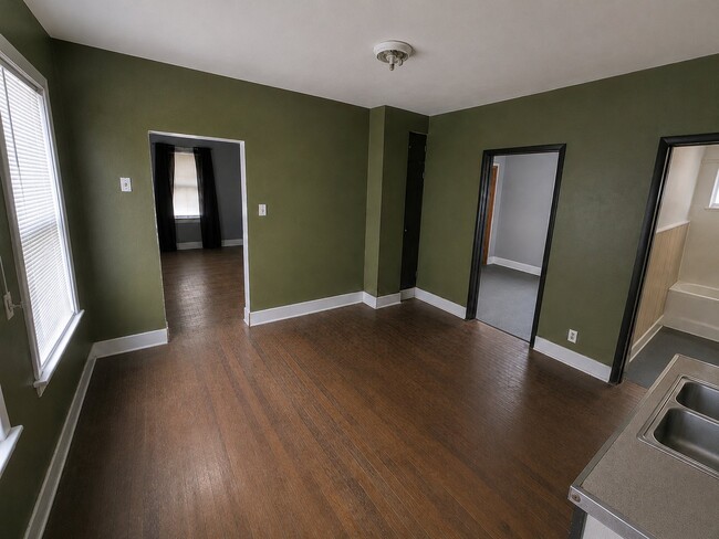Building Photo - 7006 Clement Ave Unit 3