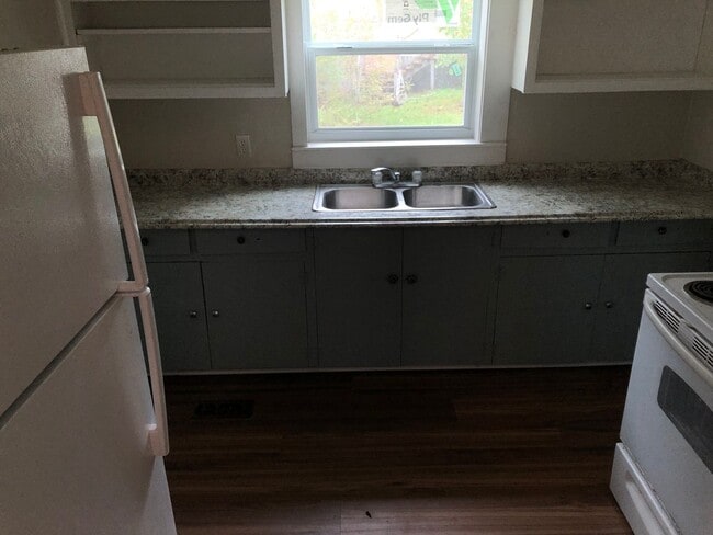 Photo - Freshly Painted 2x1 with Brand-New Plank F...