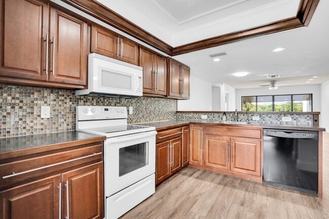 Building Photo - 1701 Presidential Way Unit A201