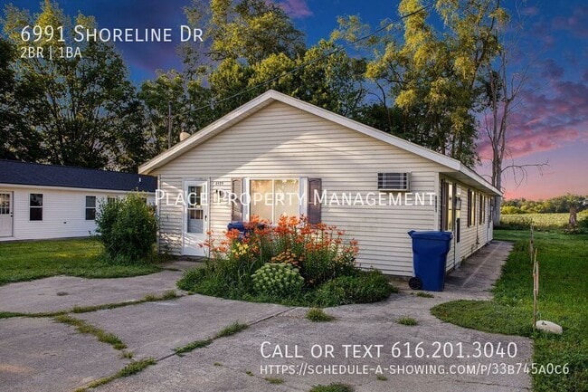 Building Photo - 6991 Shoreline Dr