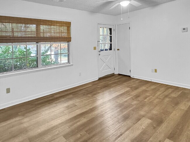 Photo - Charming 3-Bedroom Brick Ranch with Large ...