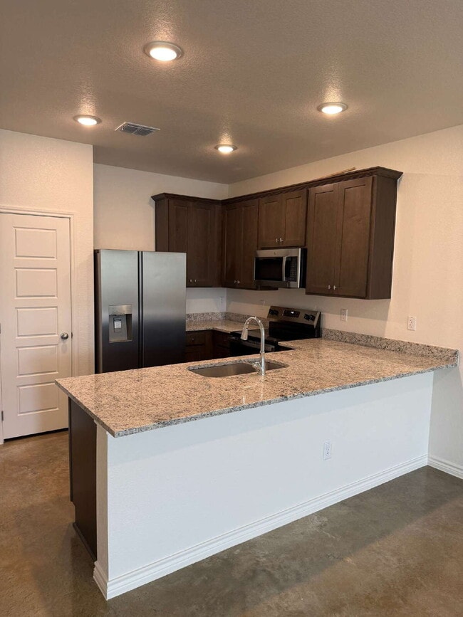 Photo - Brand New 3BR Duplex with Modern Concrete Floors & Fenced Yard! Unit B