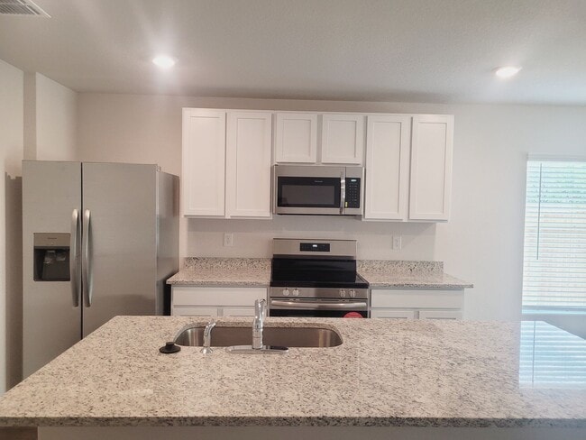 Photo - "Like New" 1-story | 4 bedroom | 2 bath home on quiet cul-de-sac with no neighbors behind in tran...