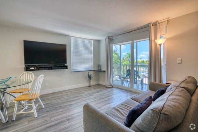 Building Photo - 5700 Bonita Beach Rd SW Unit FL2-ID1226362P Rental
