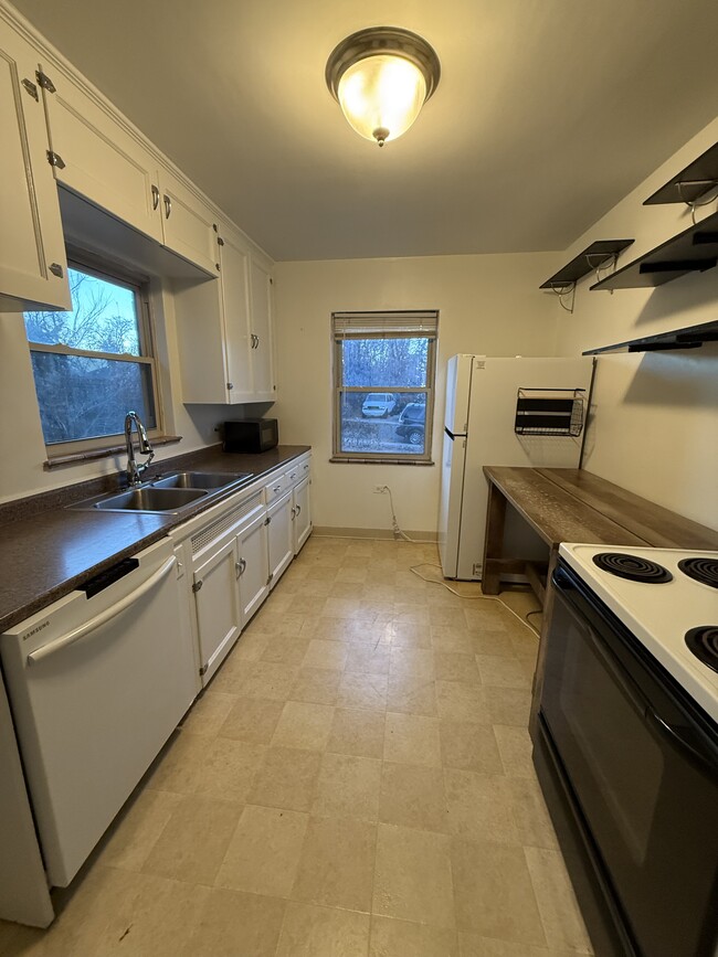 Kitchen with new fridge - 3648 Ames St