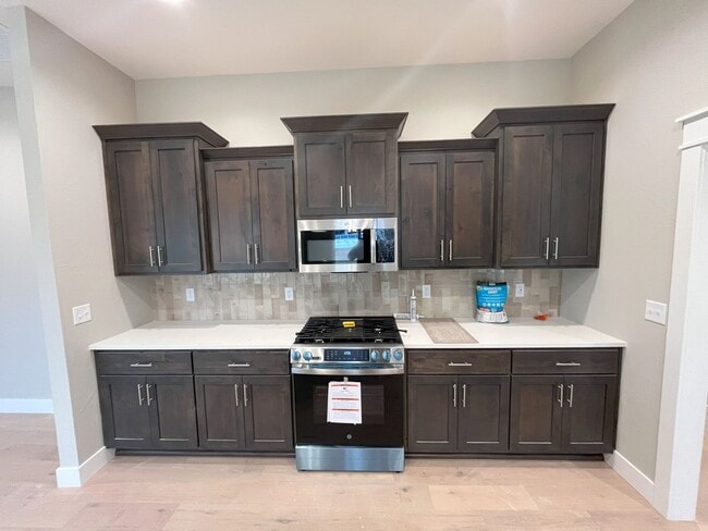 Photo - Beautiful, nearly-new 4 bedroom, 2 bath home on a cul-de-sac in the exclusive Lion's Gate neighbo...