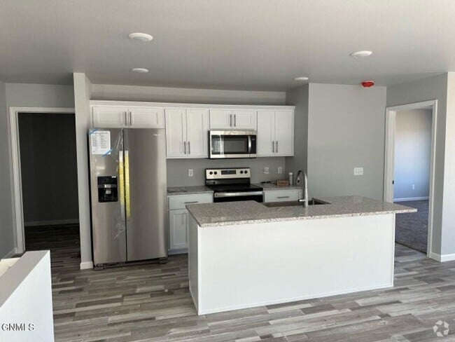 Building Photo - MODERN TWIN HOME LOCATED ACROSS THE STREET...