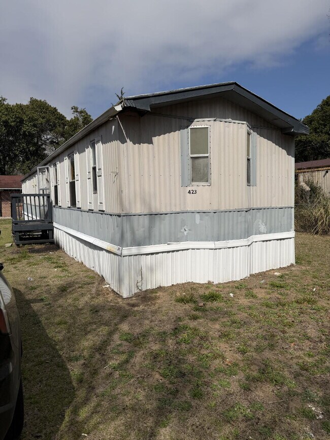 Building Photo - Handyman Special – Land + Home (Rent-to-Own)