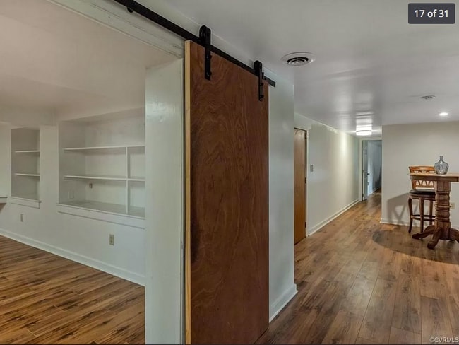 hallway with barn door - 2105 Bambacus Rd Unit Lower Apt
