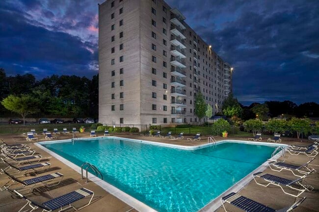 Relaxing swimming pool at Iverson Towers & Anton House Apartments in Temple Hills, MD - Iverson Towers & Anton House Apartments