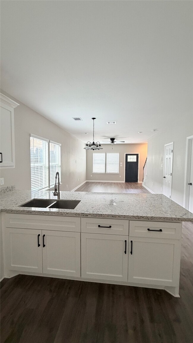 Building Photo - 7034 Smilax St Unit B