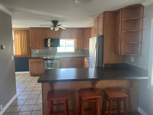 Building Photo - 17310 H Dr S Unit 1