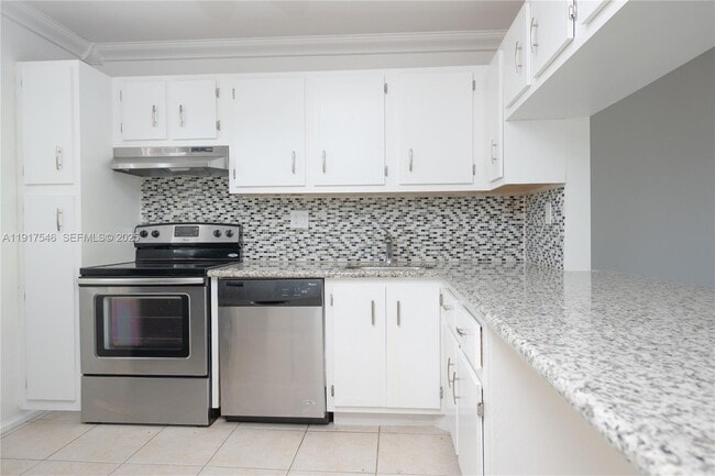 Building Photo - 8330 Sands Point Blvd Unit N307