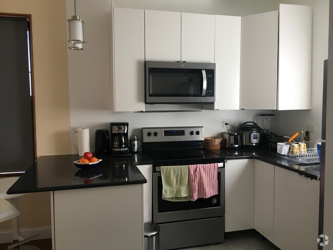 Building Photo - 516 67th St Unit 3 Rental
