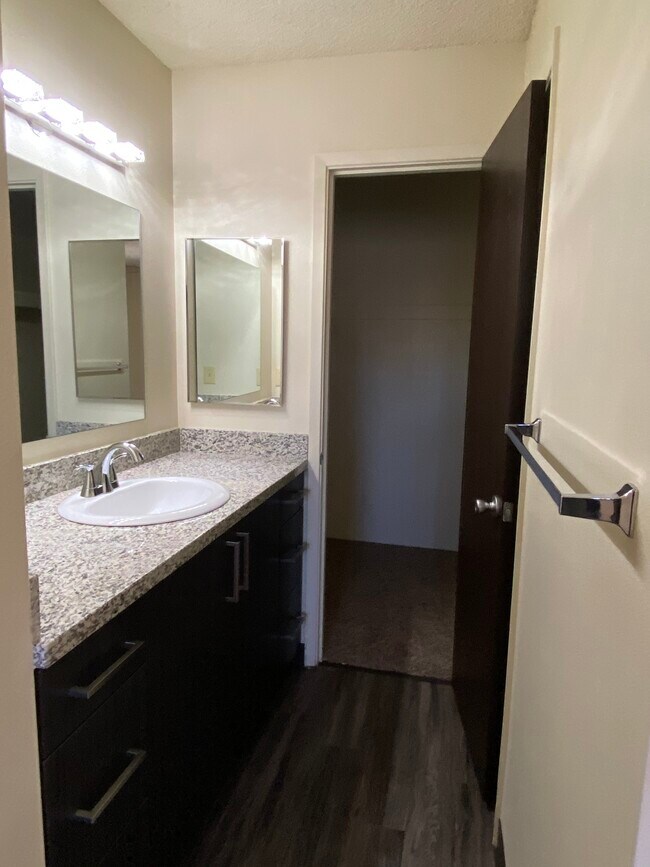 Remodeled 2 bdrm Bathroom - Dartmoor Apartments