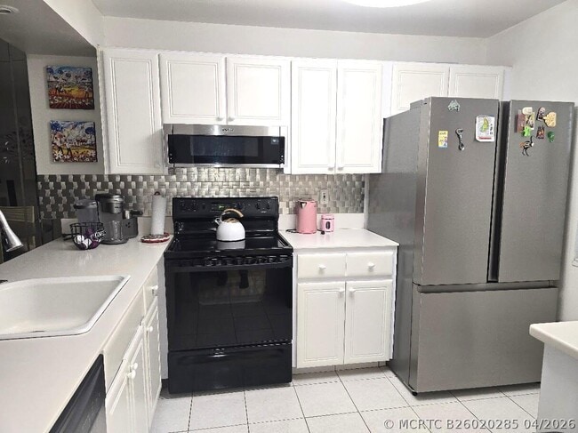 Building Photo - 4502 Martinique Way Unit G2