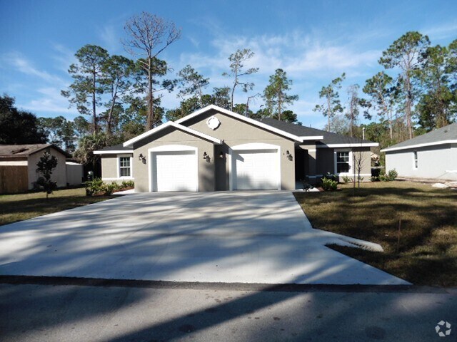 Building Photo - Roomy 3 Bed 2 Bath 1 Car Grg Home for rent...