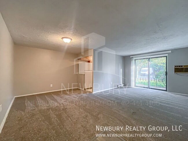 Building Photo - 1459 Poplar St Unit Apt. 5