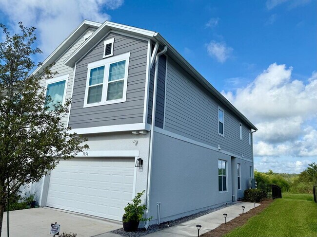 Photo - Spacious 4-Bedroom Corner Townhome with Loft & Lake Views in Ocoee