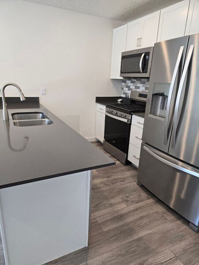 Photo - Nearly New, Well Appointed Modern Townhouse w 2 car attached garage