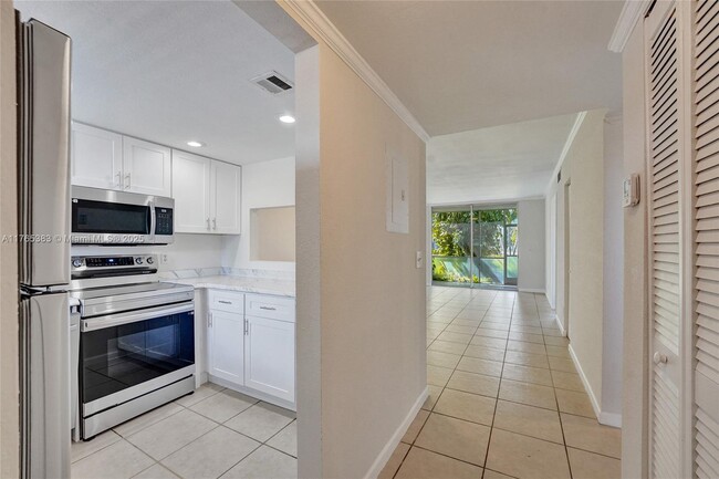 Photo - 6600 Royal Palm Blvd Condo Unit 112B