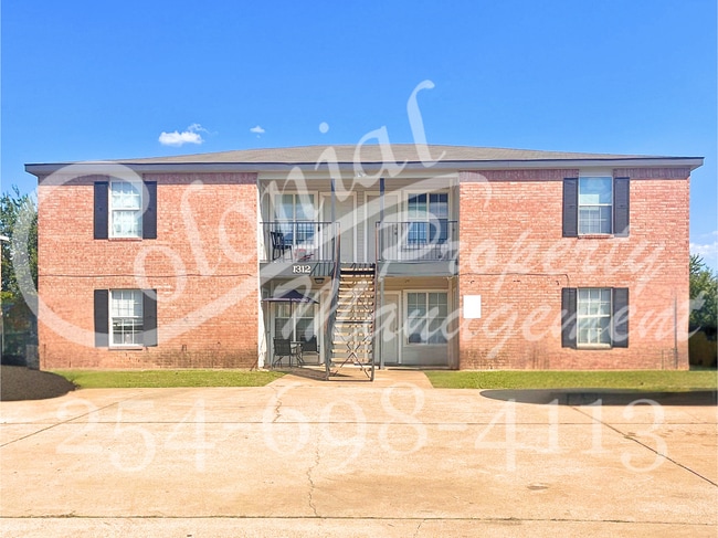 Building Photo - NEW IN MANAGEMENT - AVAILABLE NOW!