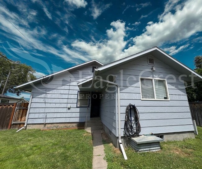 Photo - Three Bedroom, Two Bathroom House with Fenced Yard and Outdoor Fireplace