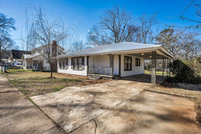 Photo - Spacious 4-Bedroom Beauty in Sylacauga – Huge Deck, Carport & Tons of Charm!