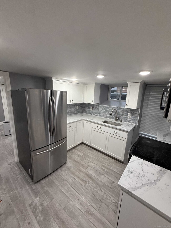 Building Photo - 303 Harlem Ave Unit LL Rental