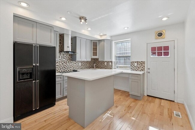 Building Photo - Updated 2BR Townhome with Dual Ensuite Baths, Hardwood Floors & Private Patio in Grays Ferry