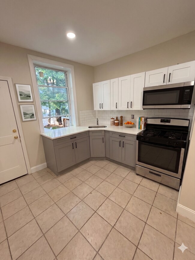Photo - Fully Renovated 3BR Single-Family Home – Newark | Central Air, Backyard & Deck