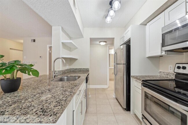 Photo - 5672 Rock Island Rd Unidad 254