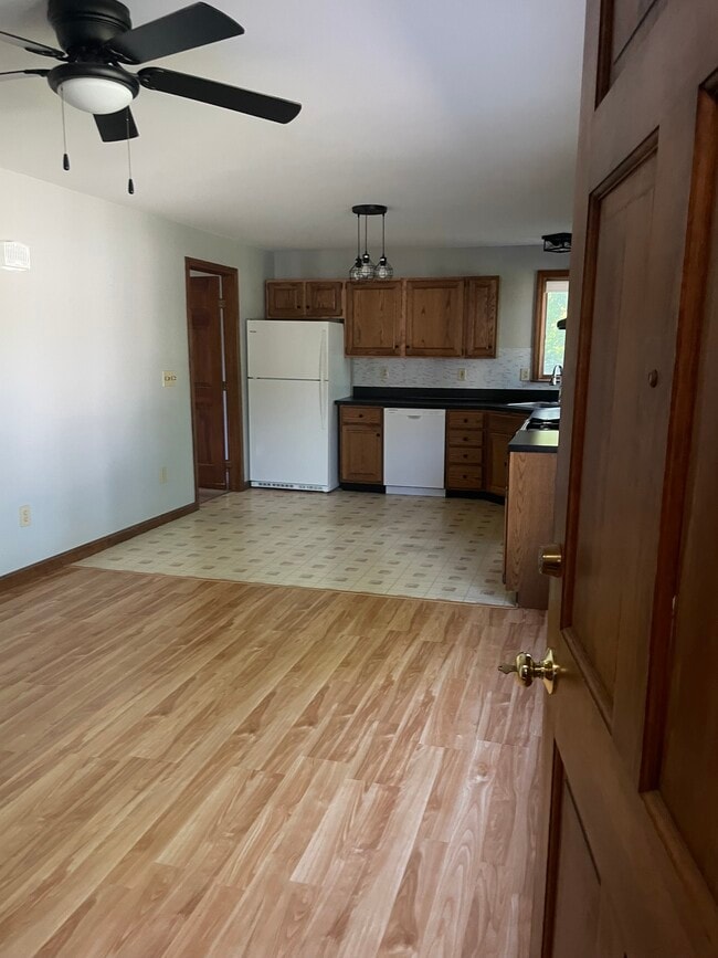 Eat in kitchen living room. - 21 Pleasant St Apartments Unit 1 Bedroom