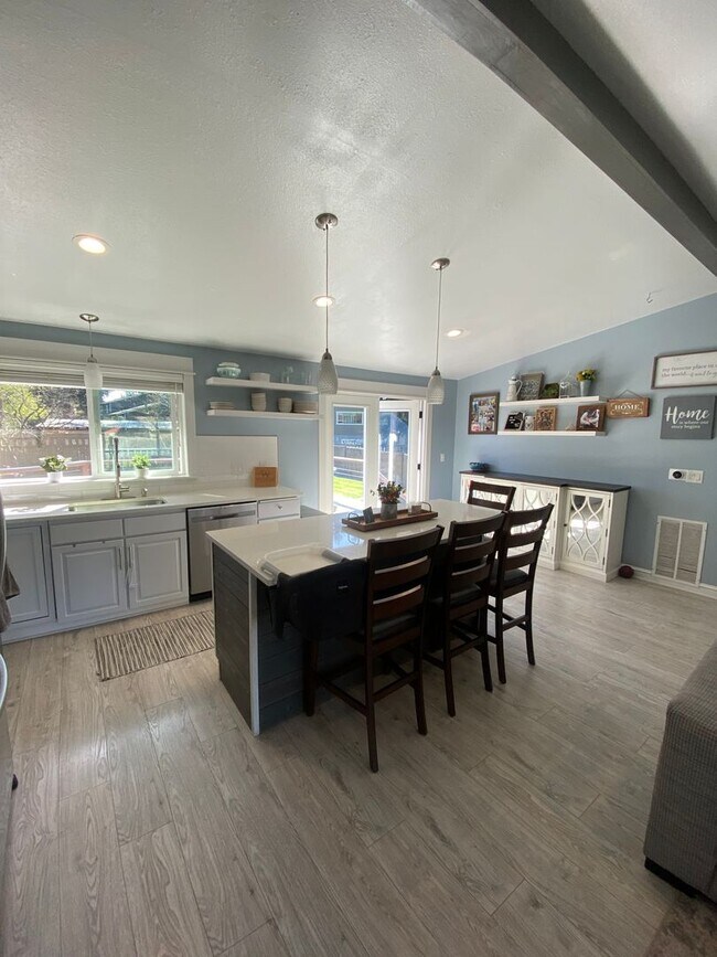 Photo - Beautifully Maintained 3 Bedroom 2 Bath Home with Garage and Fenced Yard! Pets Welcome!