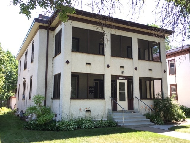 Building Photo - 3825 Grand Ave S Unit 2